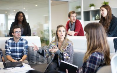 A woman running an effective meeting with tips from Learn2