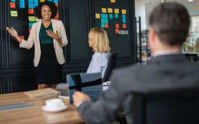 People discussing strategy during a business meeting by Learn2